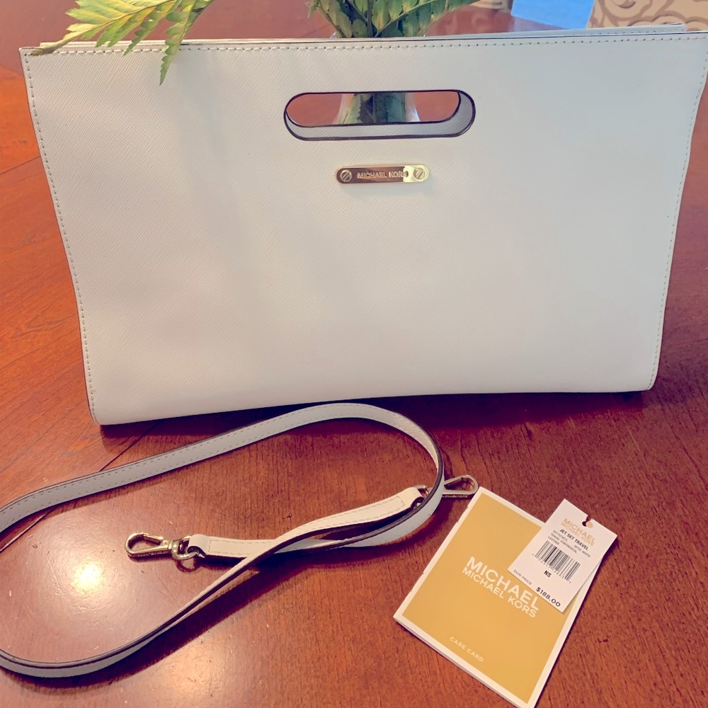 SOLD Michael Kors leather clutch w/shoulder strap